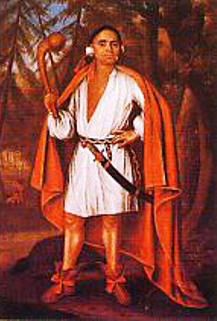 Mohican Chief holding a Wooden Ball Club